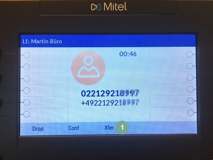 Anruf vermitteln Mitel 6869i